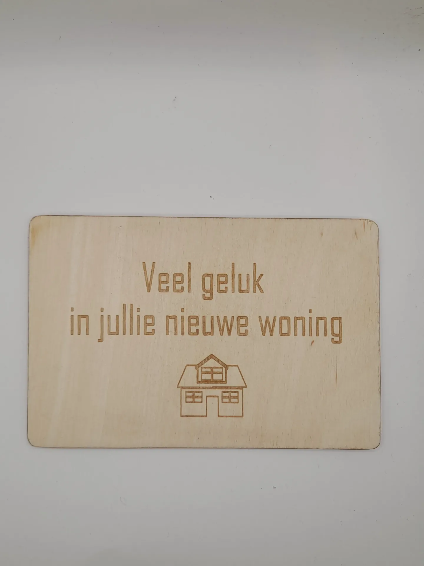 Wenskaart 'Veel geluk in jullie nieuwe woning'